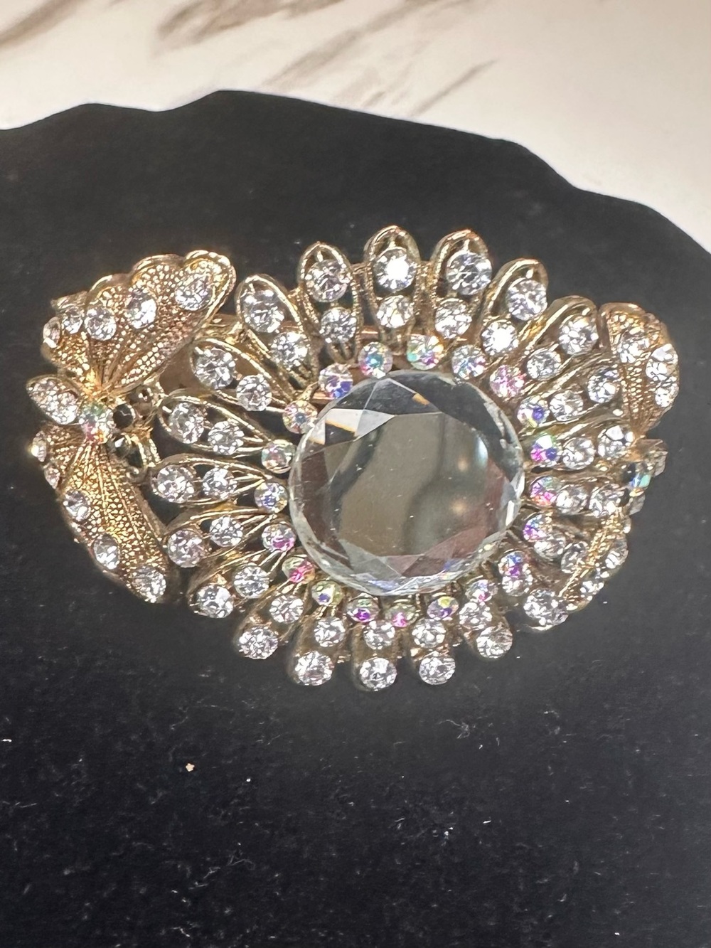 Gold-Tone Crystal Floral Brooch with Clear Center Stone